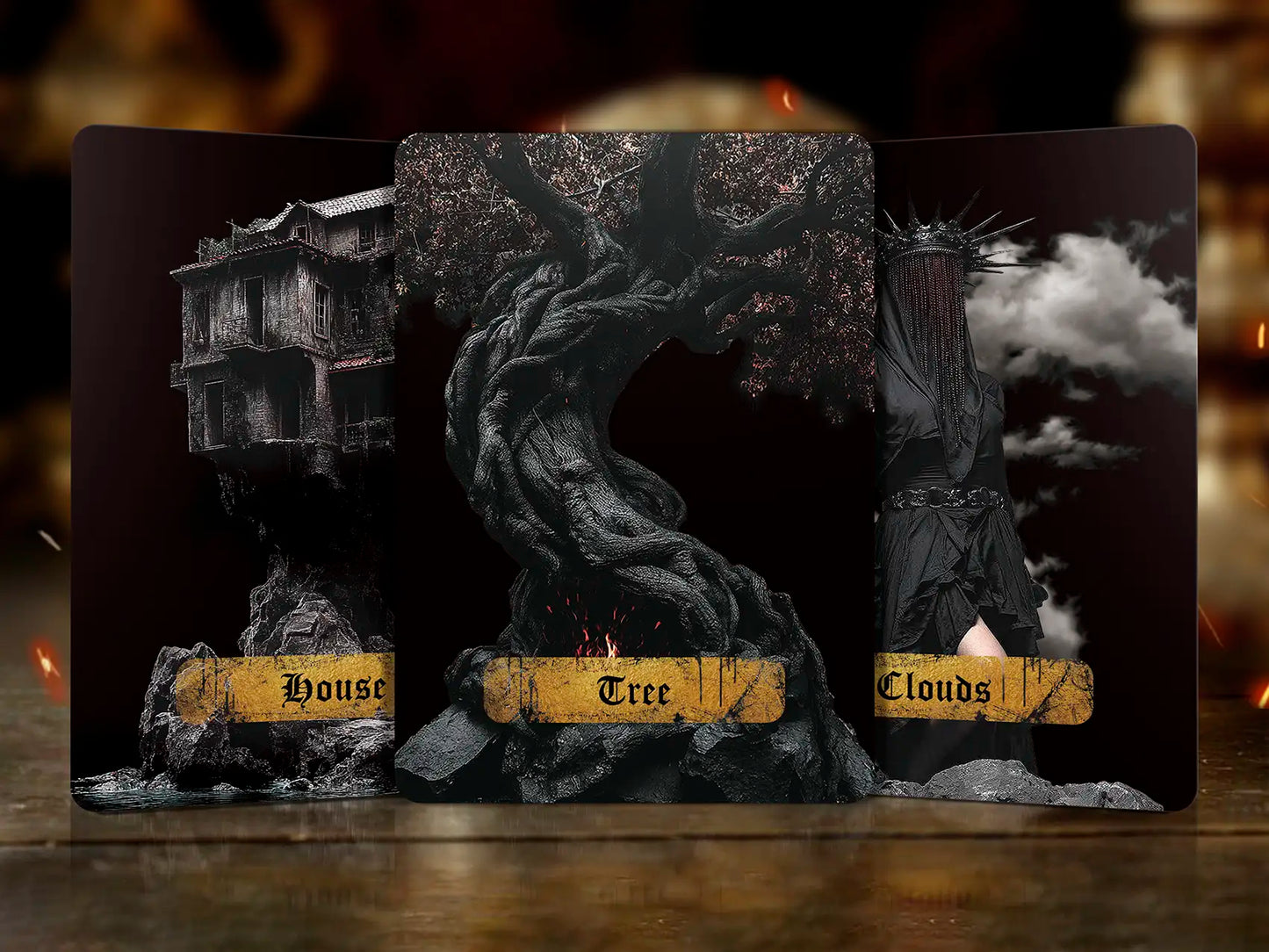 Decorative bookend set with 'House', 'Tree', and 'Clouds' design on a dark background.