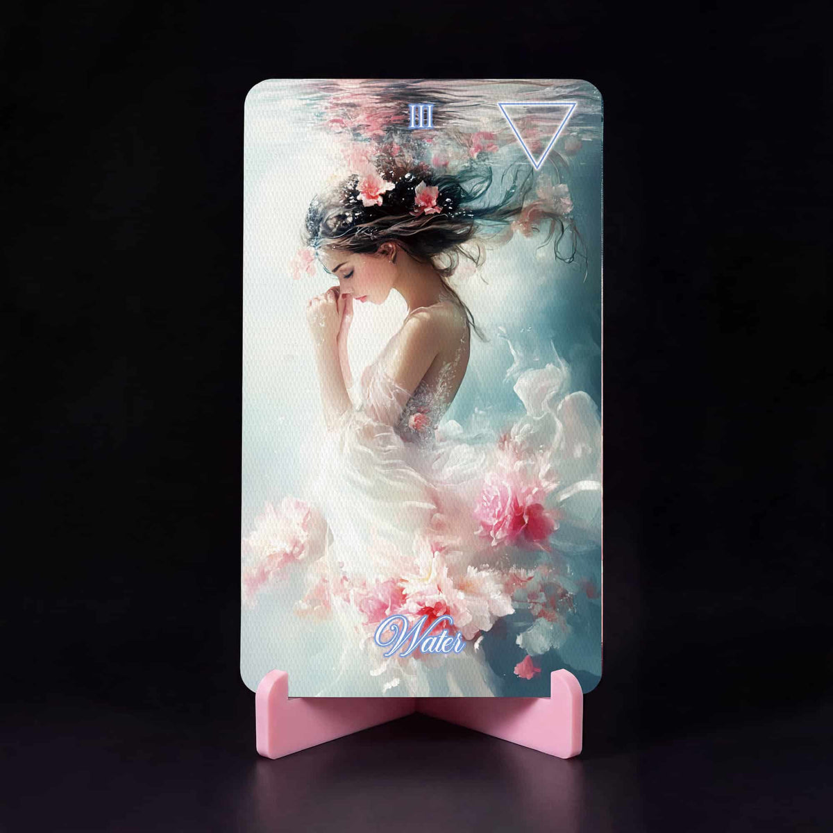 La Petite Flamme Tarot Three of Water card, woman in flowing white dress among pink flowers underwater