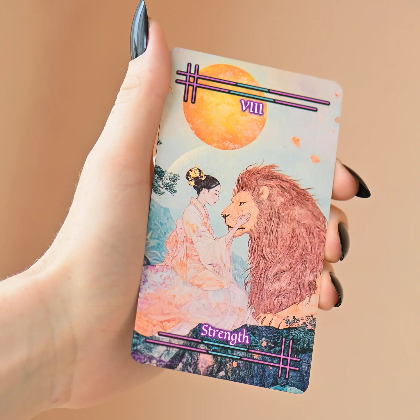 Strenght card in hand tabi no kokoro tarot deck