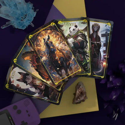 AnimaSoul Tarot major arcana fanned out: The Chariot, panda Strength card and fox and snake spirits