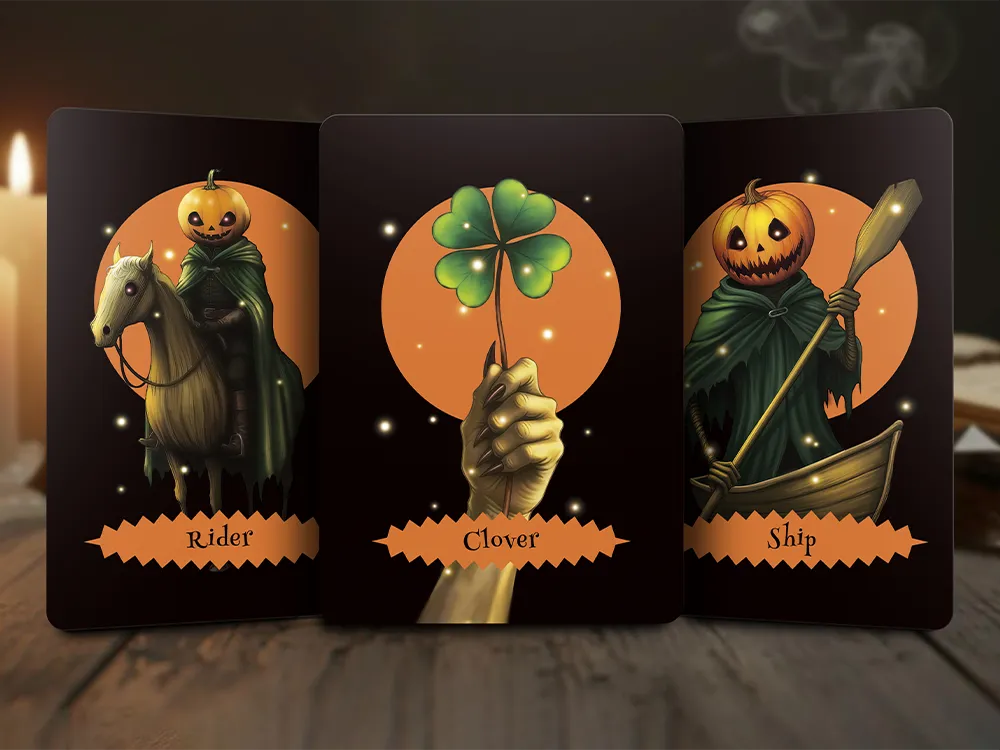 Three Halloween Oracle Lenormand cards showing Rider, Clover, and Ship with pumpkin-themed characters