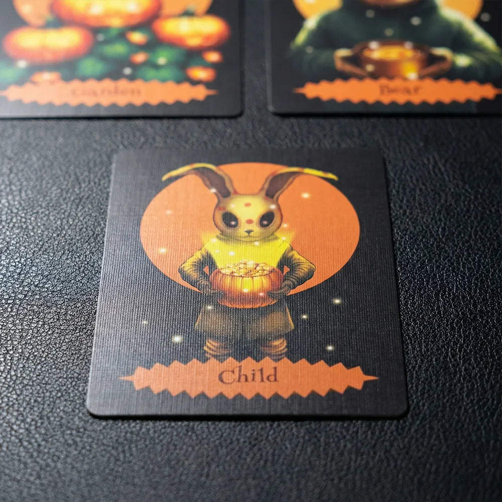 Halloween Oracle Lenormand Child card with rabbit character holding a pumpkin on dark background