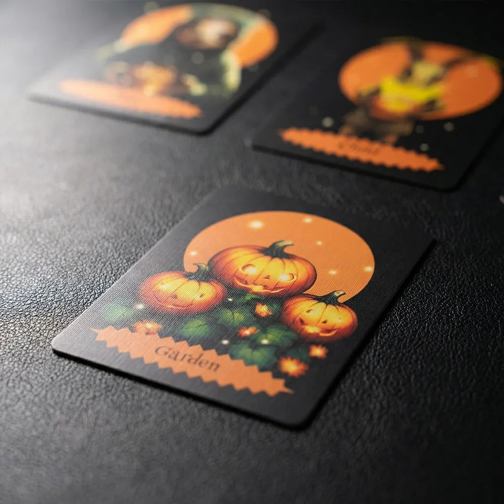 Halloween Oracle Lenormand Garden card with glowing pumpkins on dark surface