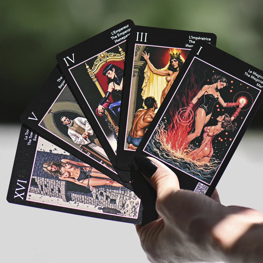 Hand fanning Les Fantaisie d'Amour Tarot major arcana: The Magician, The Empress, The Emperor, The Hierophant and The Tower