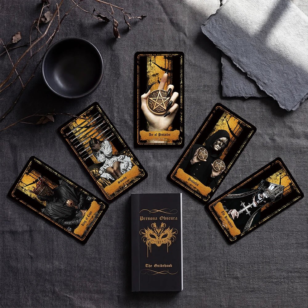Persona Obscura Tarot ritual flat lay with scattered cards and cup on dark textured background