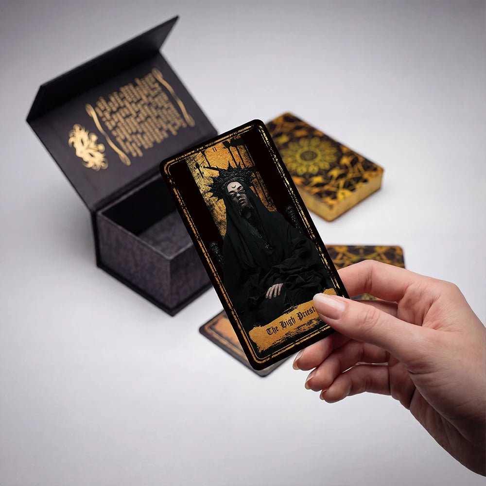 Hand holding Persona Obscura Tarot card above open box, luxury matte anti-scratch finish