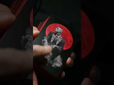 unboxing Yakuza Tarot deck in hands, matte red edges catching light