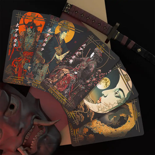Artistic layout of Reitekina Tabi Tarot cards fanned out on a decorative surface, highlighting detailed Japanese folklore illustrations