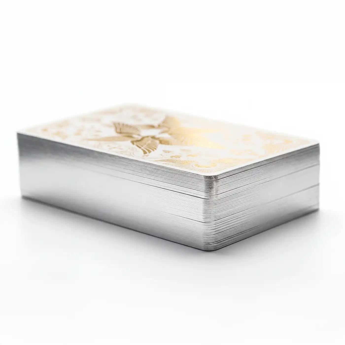 Close-up of Seraphim Tarot deck showing silver gilded edges and premium cardstock