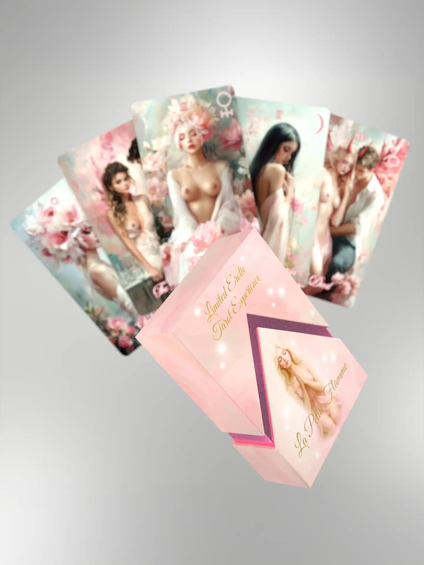 Set of tarot cards with artistic illustrations on a gray background and tarot box in centre with pink foil 